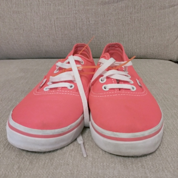 neon pink tennis shoes